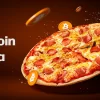 Celebración del Bitcoin Pizza Day con imagen de pizza y símbolo de Bitcoin