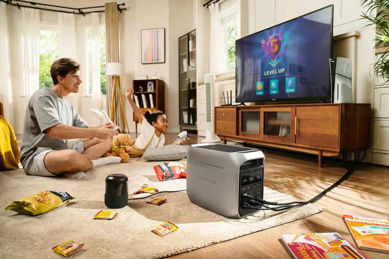 Familia disfrutando de videojuegos en casa mientras una estación EcoFlow DELTA 3 Plus proporciona energía de respaldo continua, conectada al televisor y consola de juegos.